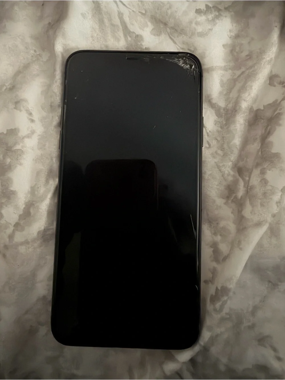 Apple iPhone with Pink Leopard Print Wallpaper and Black Case
